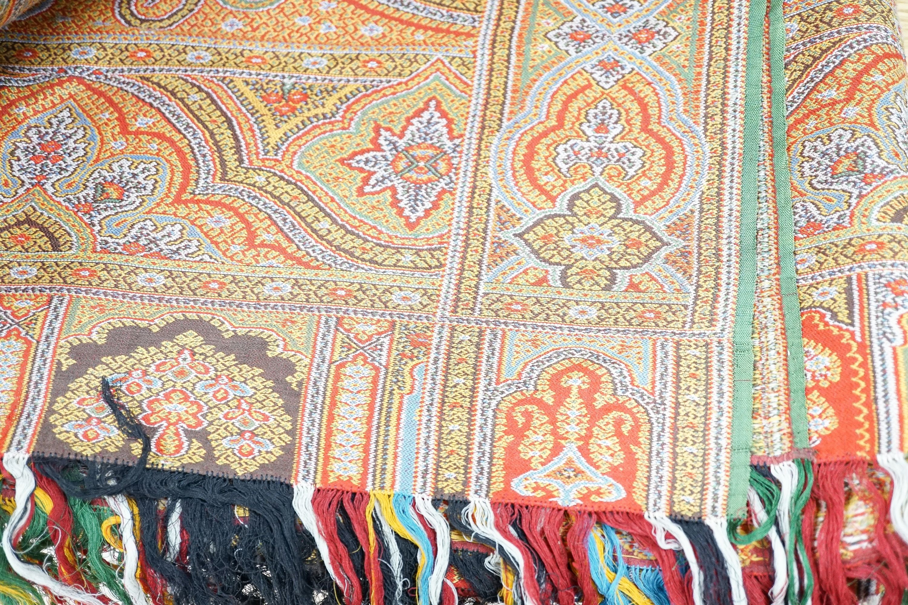 A large wool Paisley shawl, 340 x 164cm